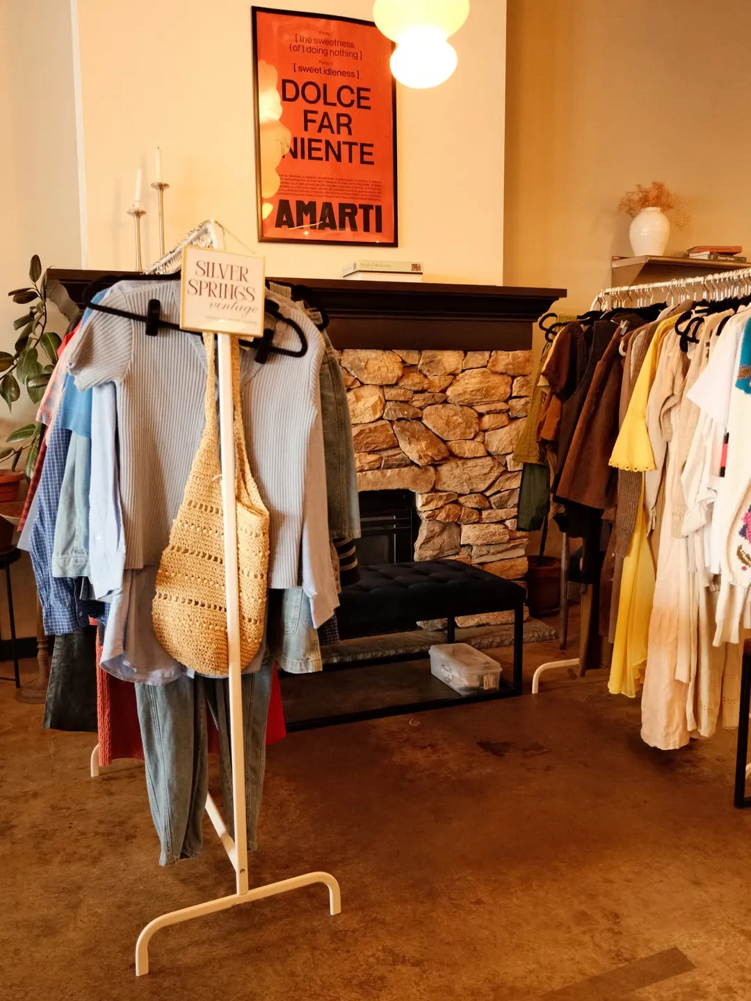 A vintage clothing rack set up in the café