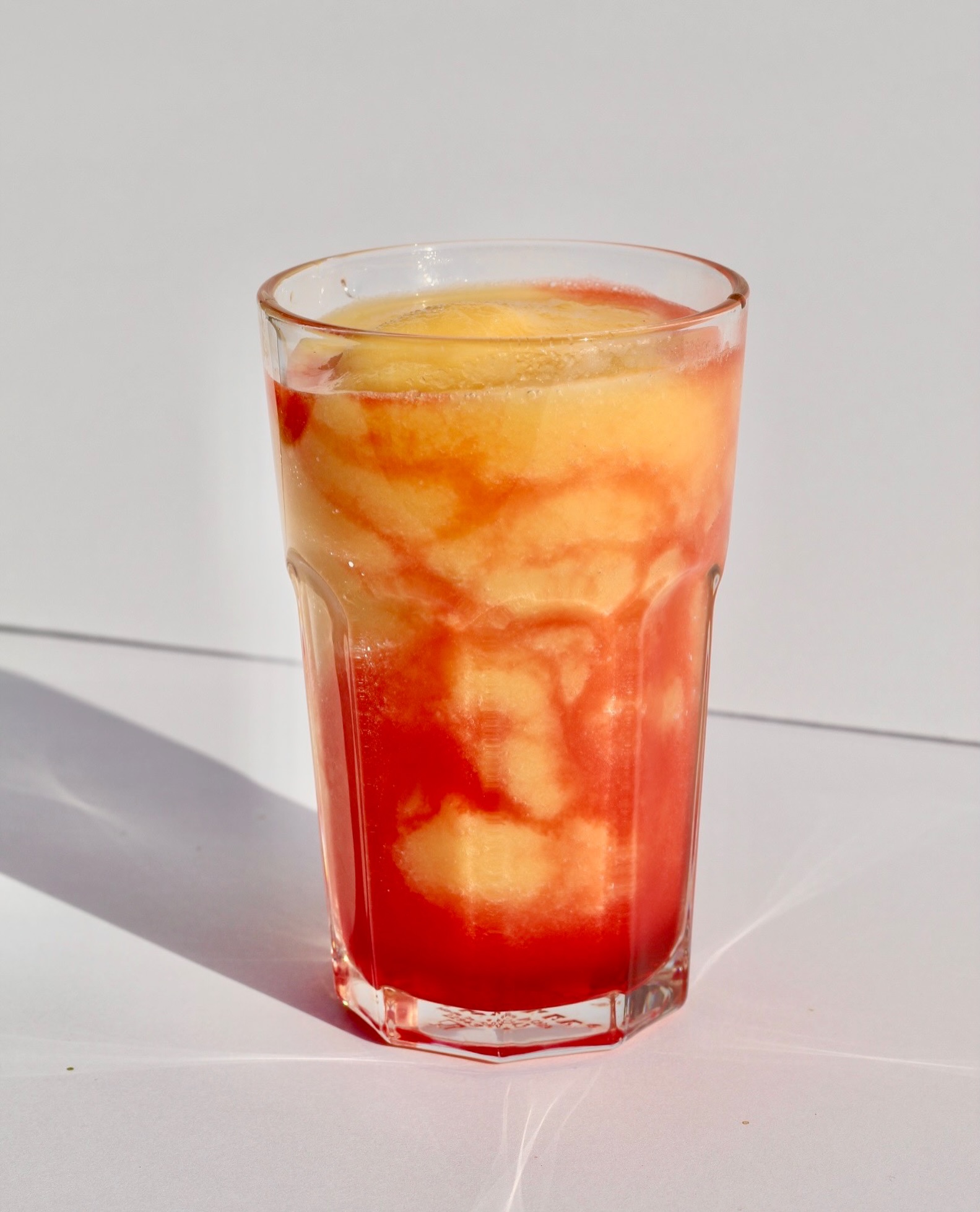 After Sunrise — blended frozen peach and lychee summer drink